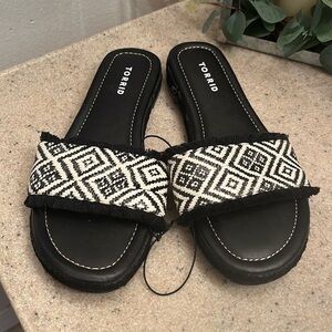 Torrid brand size 8W slip on sandals- brand new!